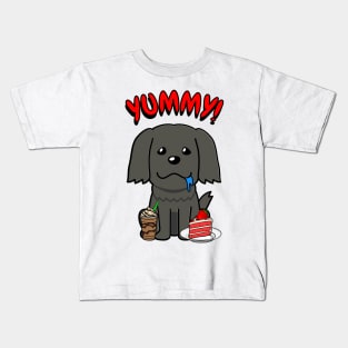 Cute black dog is having coffee and cake Kids T-Shirt